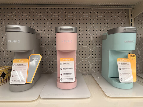 Plymouth, Minnesota - July 30, 2023: Colorful pastel Keurig K-Mini coffee maker single serve machines on display at a Target store