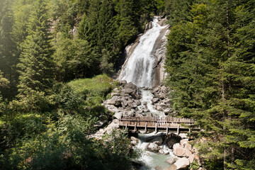 front aerial view of the Amola waterfall in the Val Nambrone Trentino