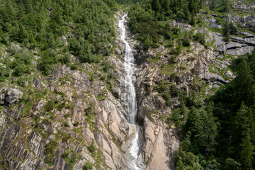 Fototapeta na wymiar aerial view of one of the waterfalls in the val di genoa trentino