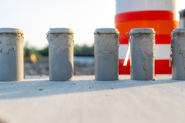 Concrete Test Cylinders on a construction site.

