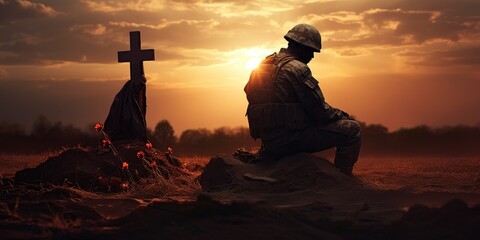 soldier kneeling before a fallen soldier in a sunset