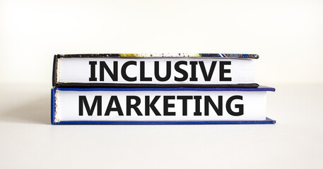 Inclusive marketing symbol. Concept words Inclusive marketing on beautiful books. Beautiful white table white background. Business inclusive marketing concept. Copy space.