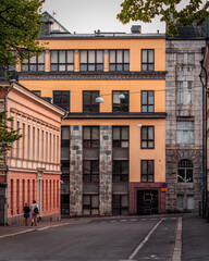 A couple walking on empty streets of Helsinki.