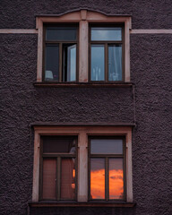 Fototapeta na wymiar Sunset reflections from windows