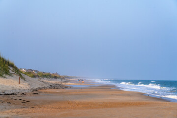 A View of people on the Beach During Golden Hour in Frisco on Hatteras Island North Carolina