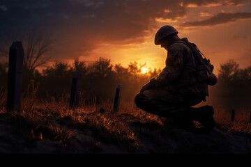 Military man kneeling of grave fallen soldier on sunset background. Generative AI - obrazy, fototapety, plakaty