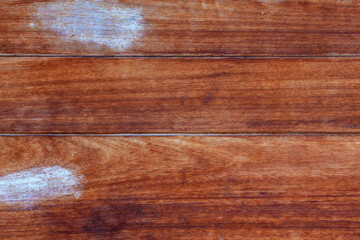 Wooden plank brown background with paint smears