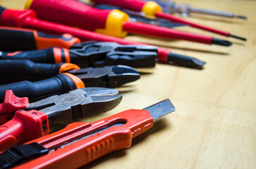Different types of tools screwdrivers, pliers, nippers.