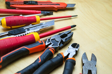 Different types of tools screwdrivers, pliers, nippers.