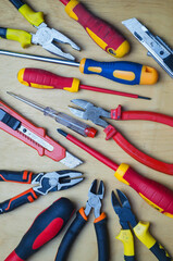 Different types of tools screwdrivers, pliers, nippers.