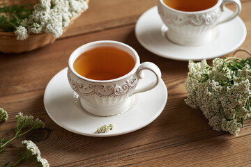 White cups of yarrow tea
