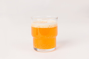 glass of beer with bubble isolated on white background
