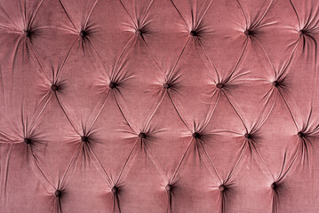 soft textile upholstery with buttons, closeup shot element