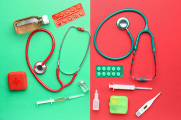 Composition with stethoscopes, pills and medical supplies on color background