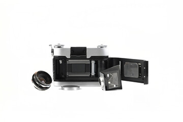 Very rare old 35 mm SLR camera on white background.