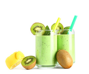 Glasses of fresh kiwi smoothie with lemon and basil on white background