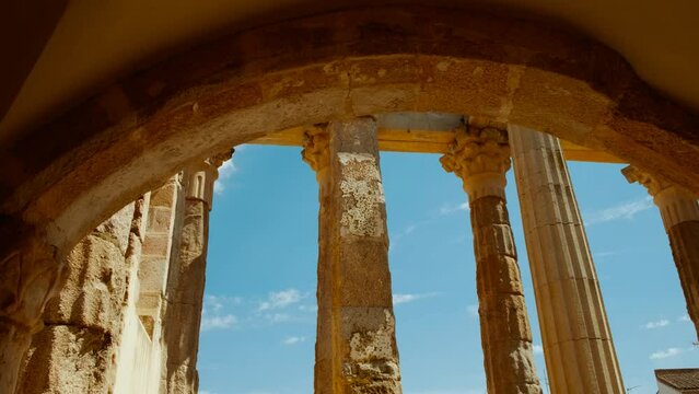 Temple of Diana, Merida, Extremadura, Spain, dating to 1 BC, majestic Roman relic standing tall, epitomizing historic grandeur amid modern urban life