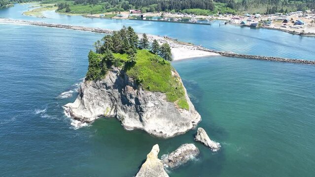 A huge sea stack is found off of the scenic Rialto Beach in Olympic National Park, Washington. This area is found at the mouth of the Quillayute River along the west coast of the Olympic peninsula.