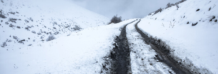 road on snowy mountain