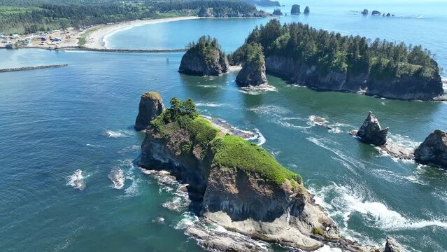 Rugged sea stacks are found off of the scenic Rialto Beach in Olympic National Park, Washington. This area is found at the mouth of the Quillayute River along the west coast of the Olympic peninsula.