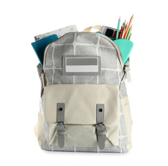 Grey school backpack with notebooks and pencils on white background