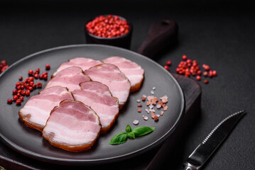Delicious smoked bacon with salt, spices and herbs