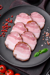 Delicious smoked bacon with salt, spices and herbs
