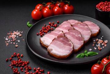 Delicious smoked bacon with salt, spices and herbs