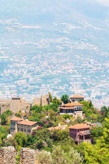 View from top of the Alanya castle in Alanya (Antalya), Turkey. Alanya Castle is a medieval castle and was built in the 13th century under the Seljuq Sultanate. Famous tourist landmark. Vertical shot