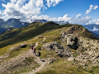 Fototapeta na wymiar Trail running in the Swiss mountains. Run in a breathtaking environment. Trail run on narrow paths. Trailrun, running. High quality photo