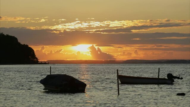 Time-lapse, sunset over the Baltic Sea, boats, Habernis, Steinberg, Schleswig-Holstein, Germany, Europe