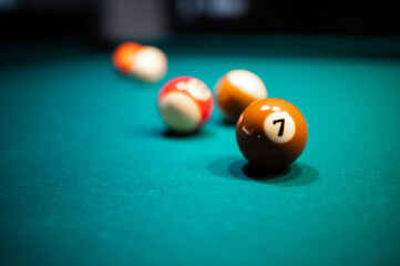 Closeup shot of a number 7 ball on a pool table