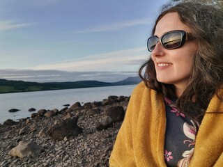 Woman on beach at sunset