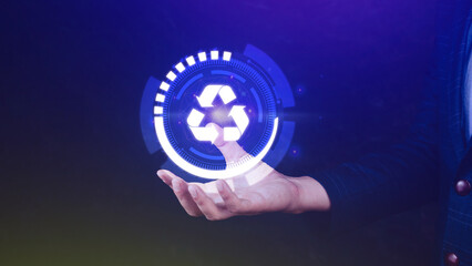 Businessman hand holding recycle icon concept in screen, for environmental, social and governance in sustainable and ethical business on the Network connection.