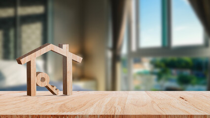 Mockup wooden house and key on wooden table, concept of real estate investment. Planning savings money of coins buy home concept for property, mortgage and real estate investment.