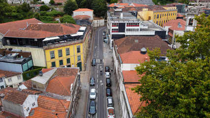 Aerial flight over car traffic, in the historic city of Porto (Oporto) in Portugal.