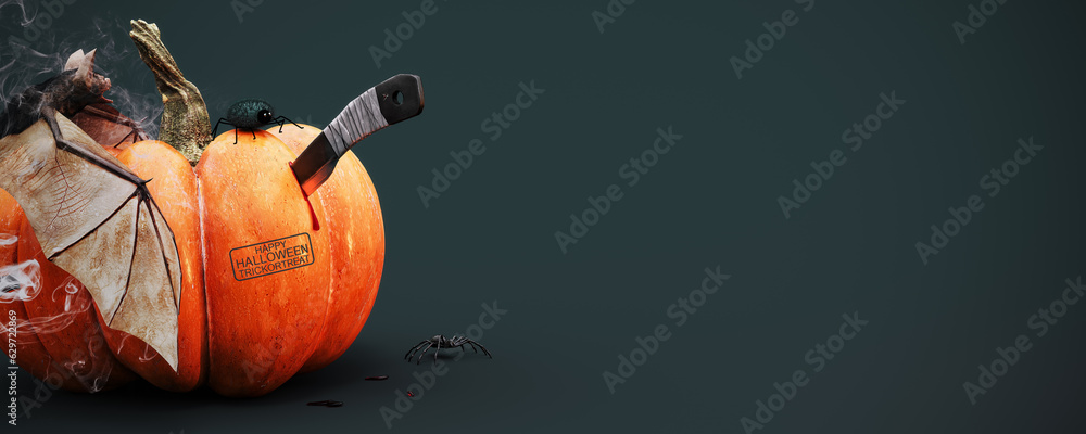 Wall mural happy halloween. trick or treat. pumpkin with bat and carving knife on dark green background with co