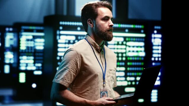 Engineer maintenancing server hub to optimize it for data processing requirements of artificial intelligence workloads. Specialist inspecting neural network data center used for machine learning