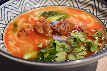 Beef noodle soup in a beautiful bowl