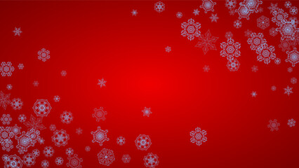 Naklejka na ściany i meble Christmas frame with snowflakes on red background. Santa Claus colors. Horizontal Christmas frame for holiday banners, cards, sales, special offers. Falling snow with bokeh and flakes for celebration