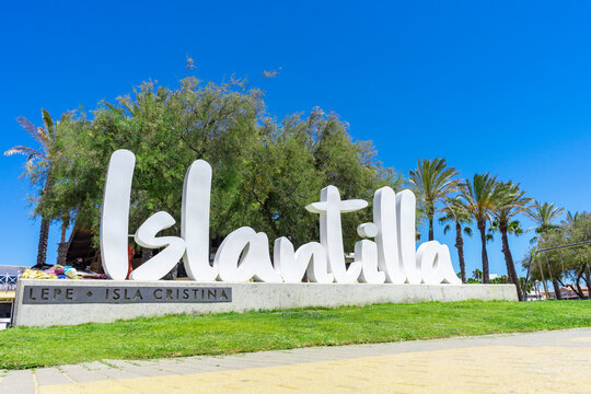 "ISLANTILLA, HUELVA-SPAIN"; 07-29-2023: Islantilla touristic photocall sign at the beach promenade. Travel destination in Andalusia on summer vacations.