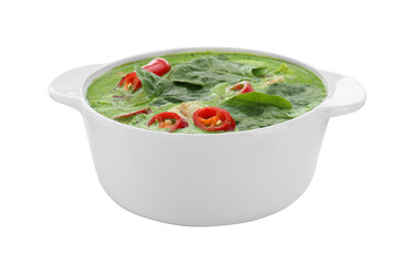 Saucepan of delicious green curry soup with chicken isolated on white