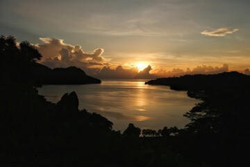 Beautiful aerial landscape during golden sunrise overlooking remote tropical Pokpok Island and ocean views in Bougainville, Papua New Guinea
