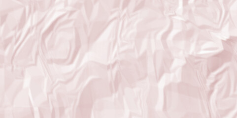 Crumpled paper texture and pink crumpled paper texture crush paper so that it becomes creased and wrinkled. Old pink crumpled paper sheet background texture.	