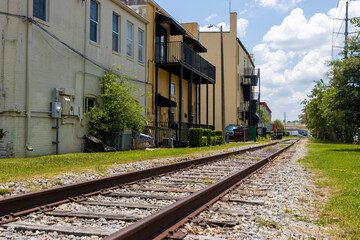 Fototapeta premium Railroad tracks small town