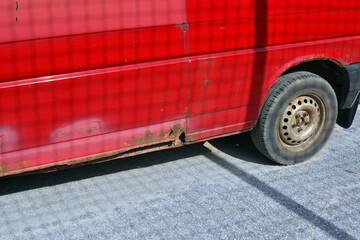 Rusted car body part view of the car