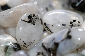 Close up Group of Moon Stones polished in a pile