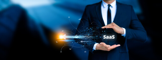 SaaS - software as a service. Technology and network concept. Code line of programming internet...