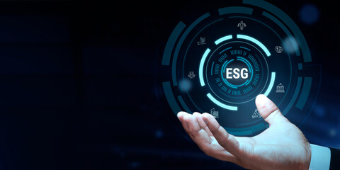 ESG concept in the hand for environmental, social, and governance in sustainable and ethical business on the Network connection