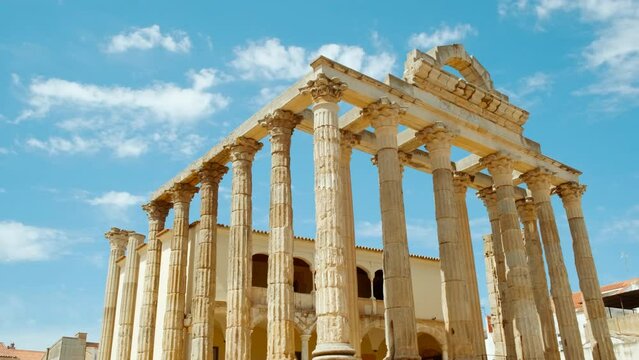 Temple of Diana, Merida, Extremadura, Spain, dating to 1 BC, majestic Roman relic standing tall, epitomizing historic grandeur amid modern urban life
